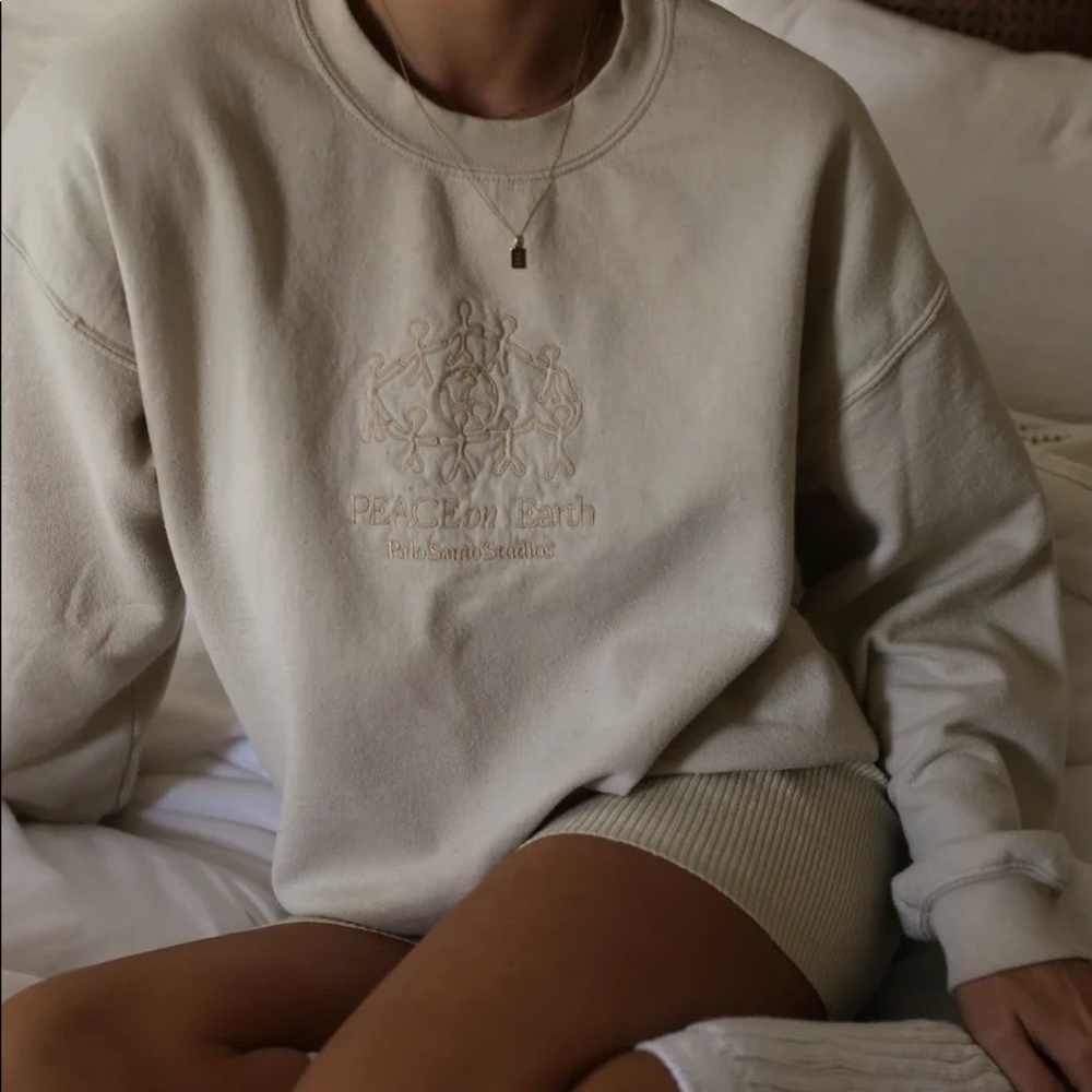 Palo Santos Studios “Peace On Earth” Pullover.